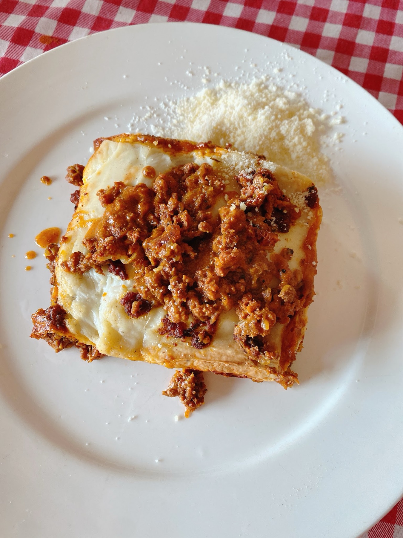 A real Casa Mia lasagna served on a white plate